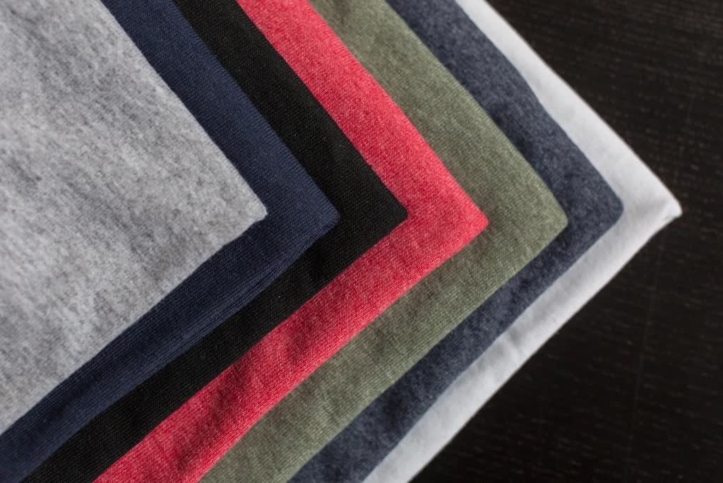 Placeholder image of folded t-shirts — to be replaced with real North Prime Graphics photos