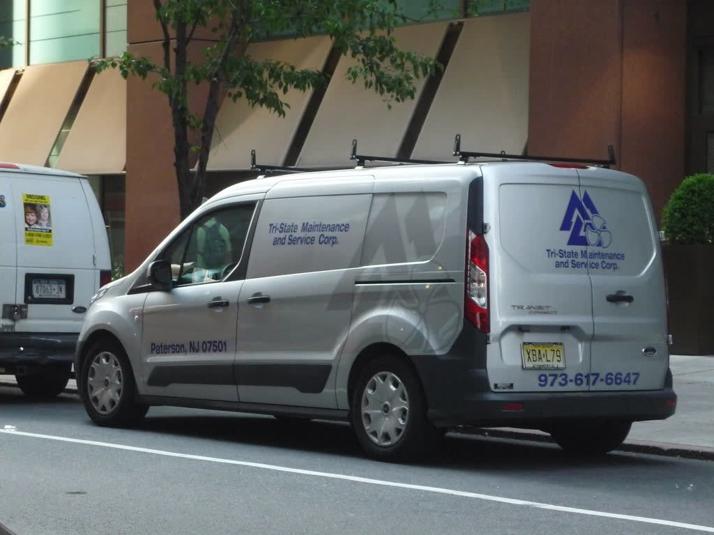 Placeholder image of vehicle lettering on a company van — to be replaced with real North Prime Graphics photos